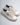 Sneaker bianca con lacci maxi e fondo rigato 