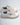 Sneaker bianca con lacci maxi e fondo rigato 