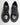 Sneaker nero con lacci maxi e fondo rigato 