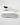 Sneaker total white con lacci maxi e fondo rigato 